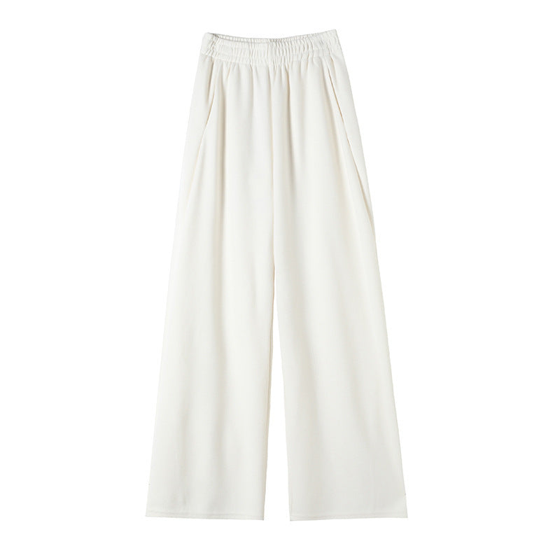 Pantaloni stretti a gamba larga con piccolo effetto drappeggio