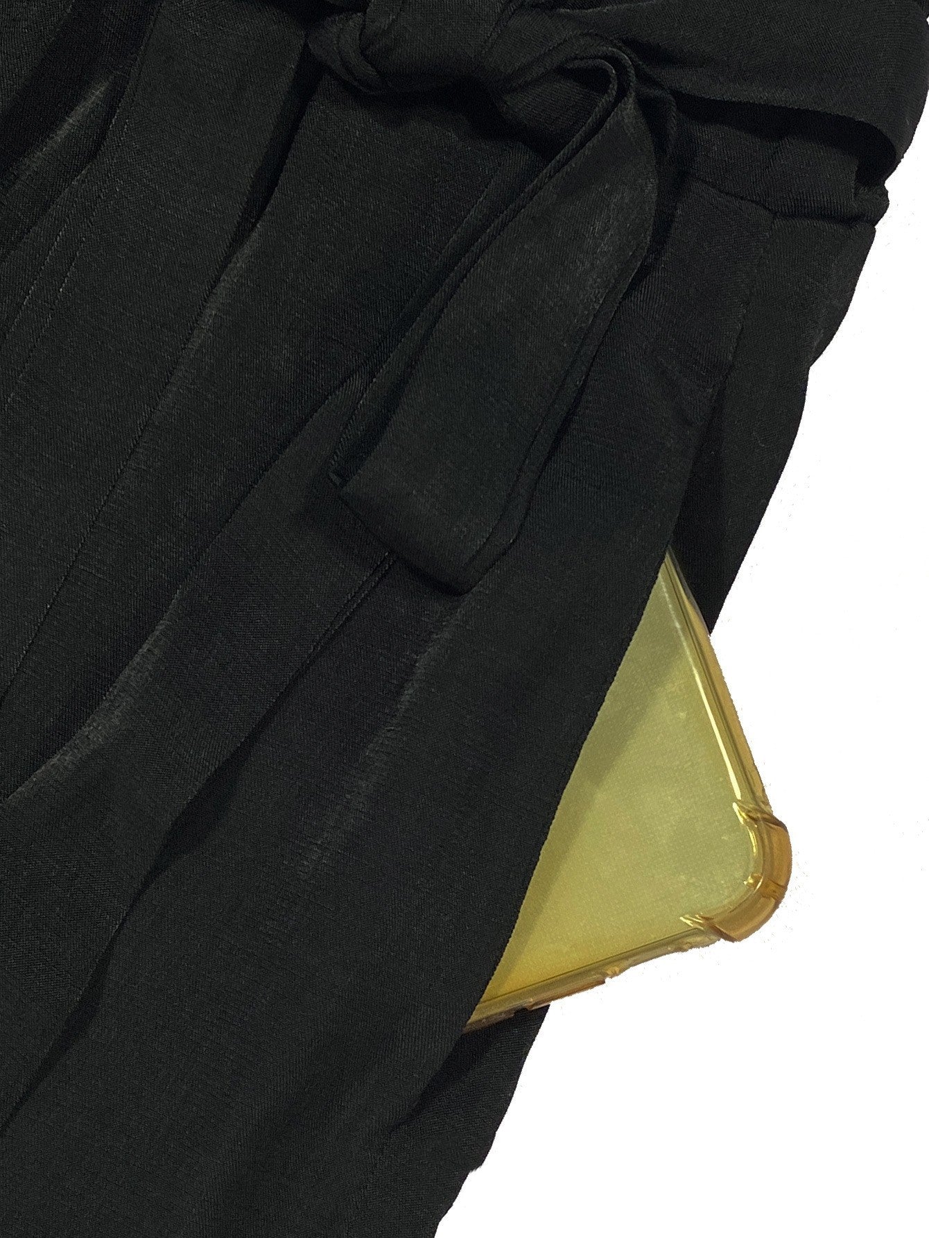 Pantaloni larghi con lacci in tinta unita