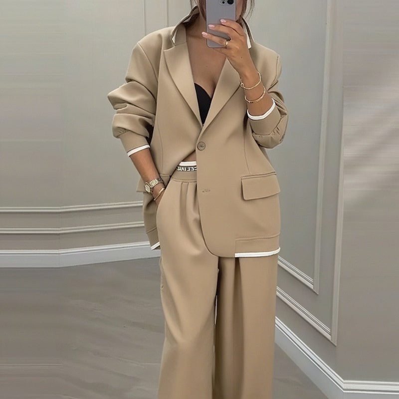 Completo casual da donna con giacca a maniche lunghe e pantaloni a gamba larga