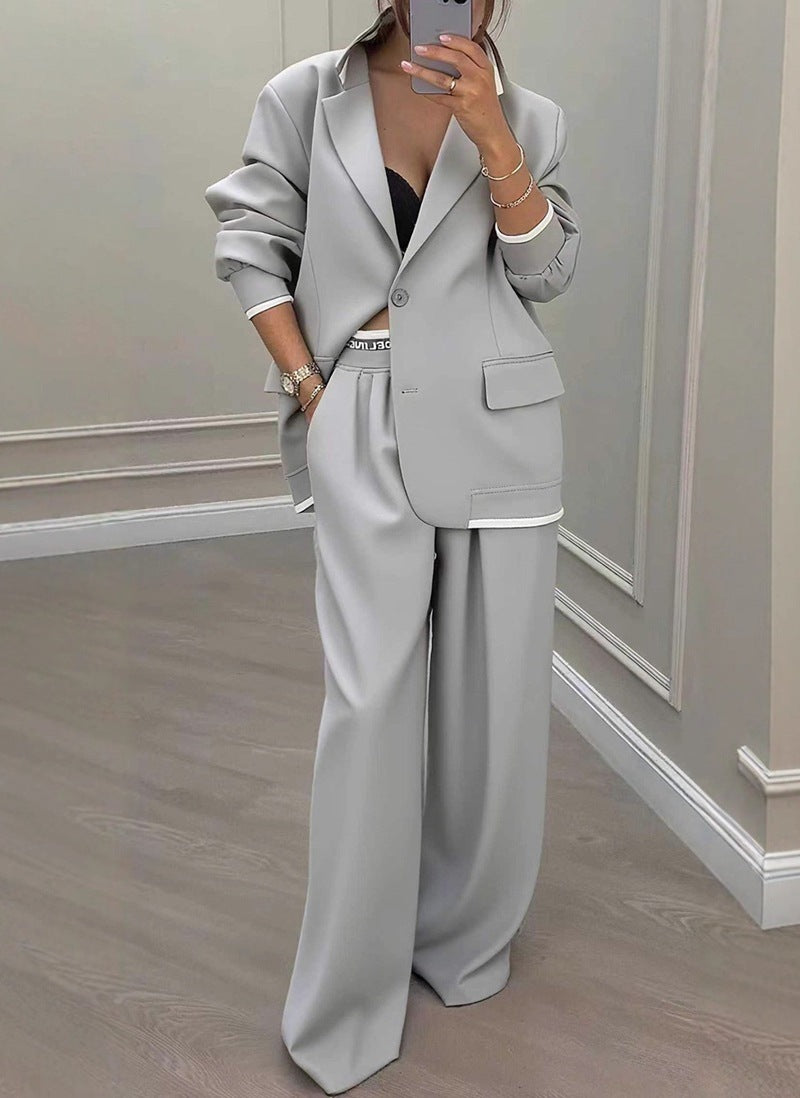 Completo casual da donna con giacca a maniche lunghe e pantaloni a gamba larga