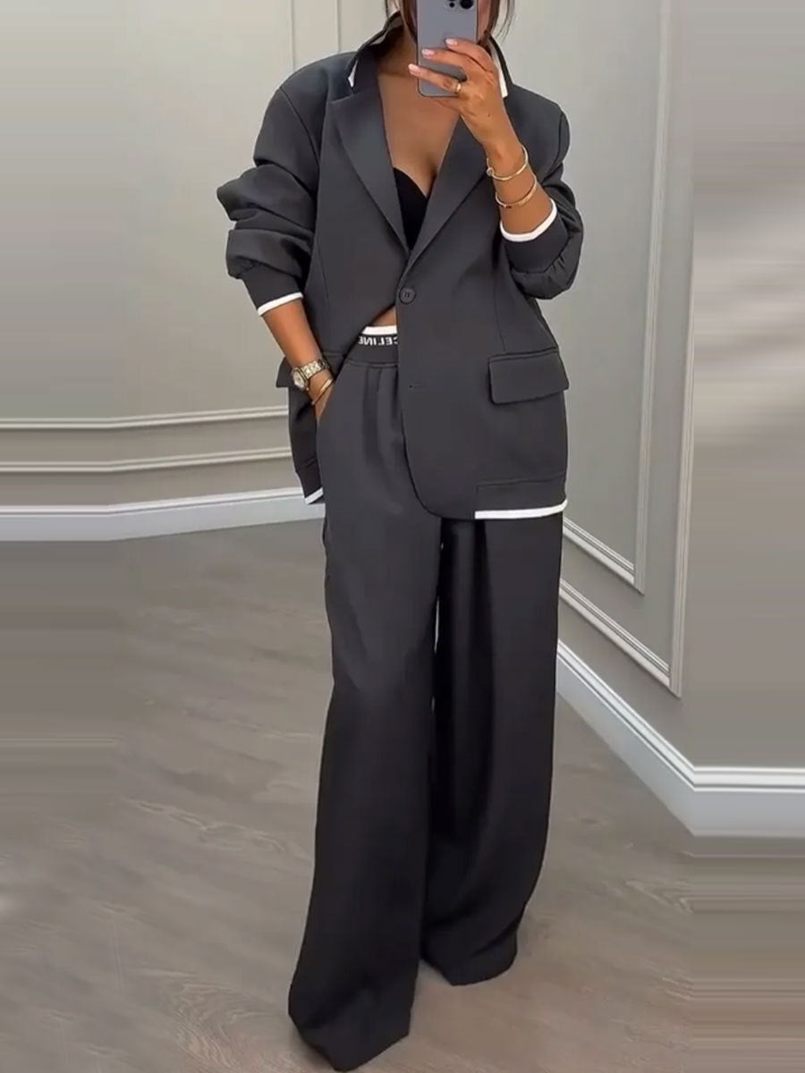Completo casual da donna con giacca a maniche lunghe e pantaloni a gamba larga