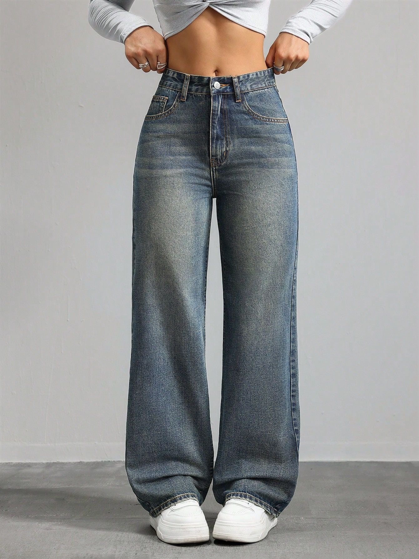 Jeans a gamba larga  vita alta