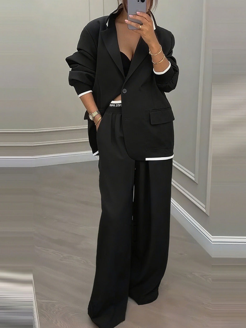 Completo casual da donna con giacca a maniche lunghe e pantaloni a gamba larga