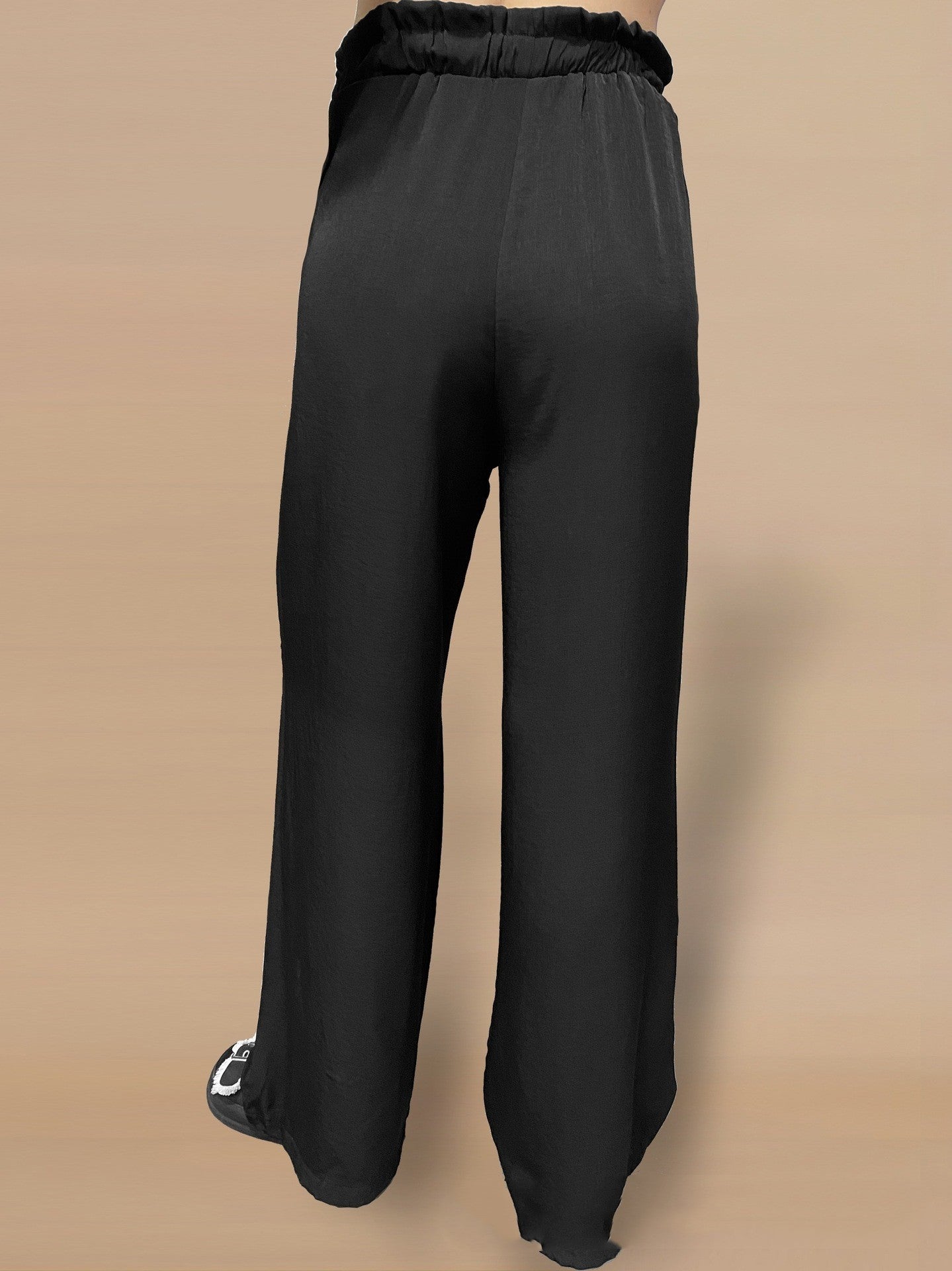 Pantaloni larghi con lacci in tinta unita
