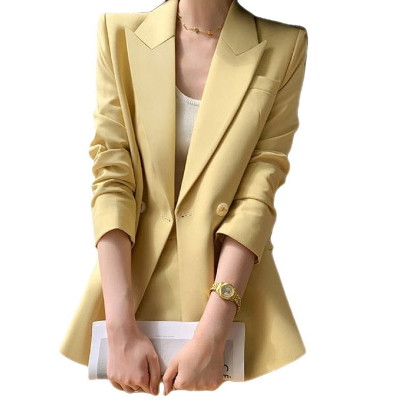 Completo donna in stile retrò artistico, composto da giacca e pantaloni cropped.