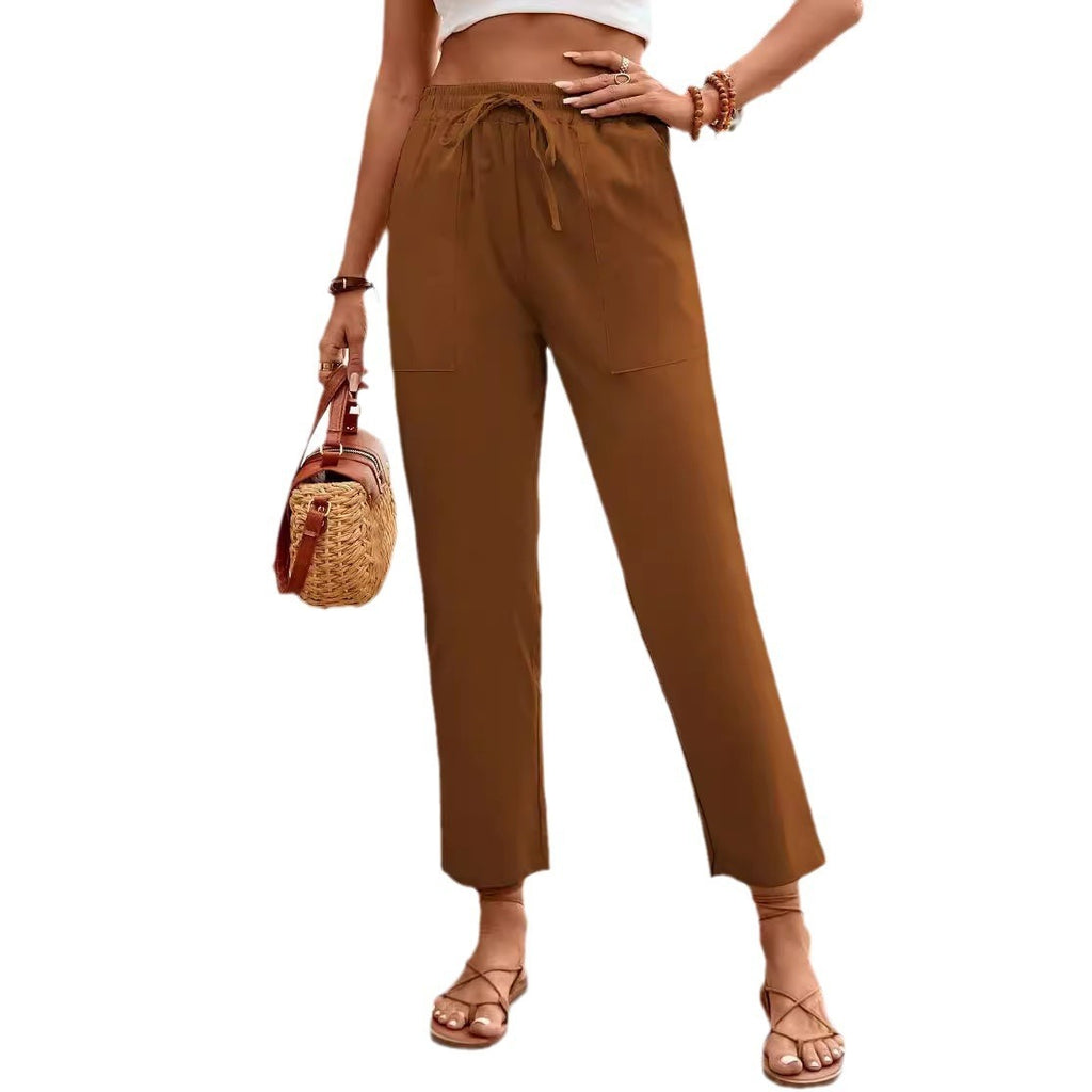 Pantaloni casual larghi con coulisse stringate da donna