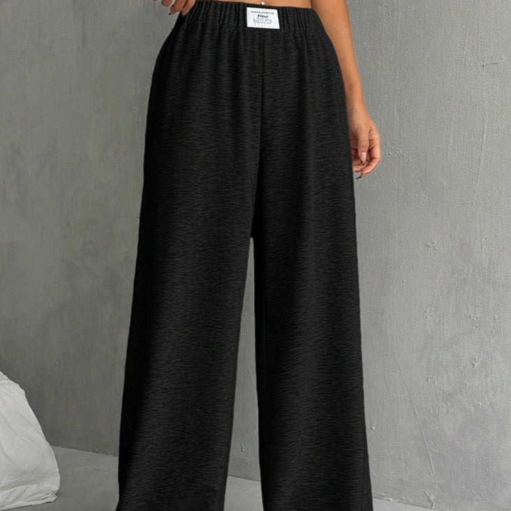 Comodi pantaloni larghi a vita alta a gamba larga
