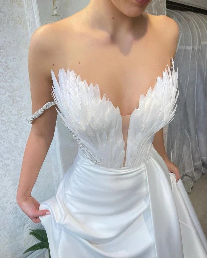 A Dress With Feathers Sweeping The Floor - VAleG