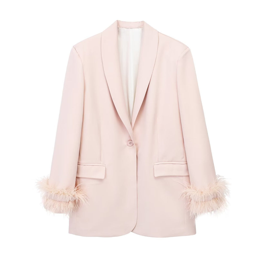 Completo composto da giacca e pantaloni a gamba larga